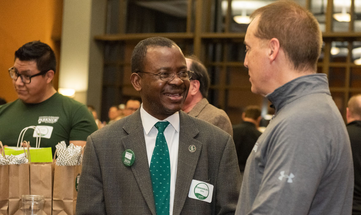 Emmanuel Otu, dean of the College of Natural and Health Sciences, and Jeff Werwie ‘79 
