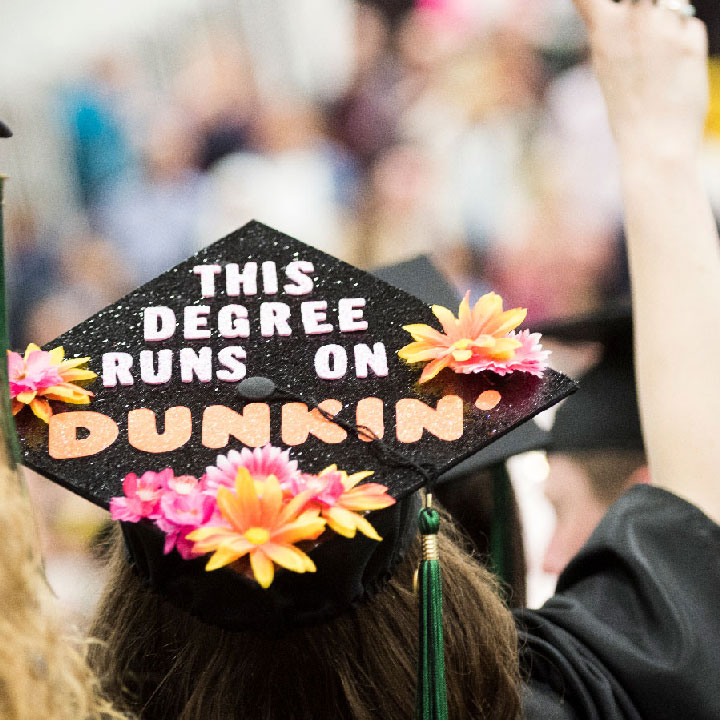Mortar board that reads - This degree runs on Dunkin