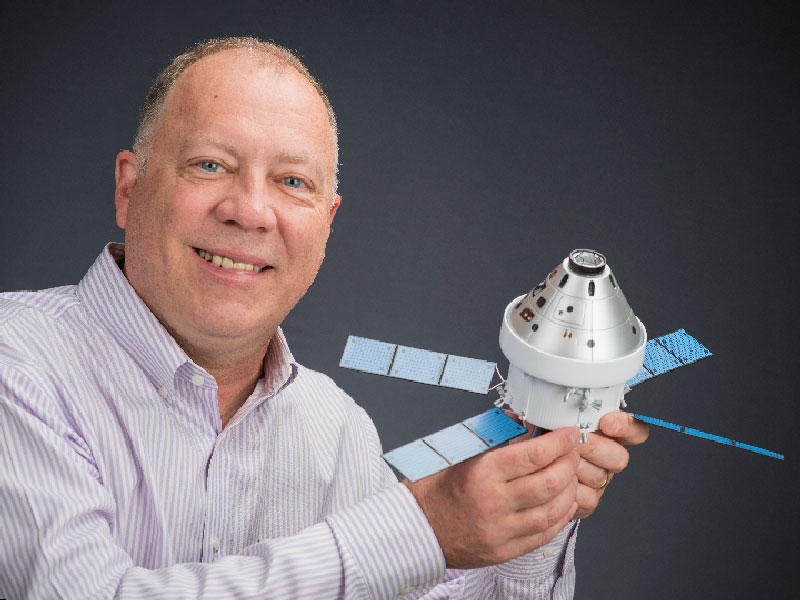 Daryl Sauer with model satellite