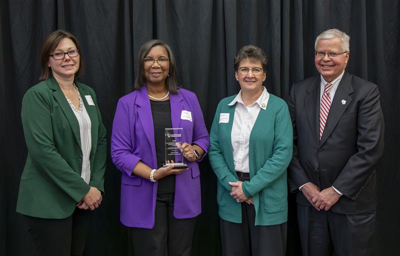 Chancellor Akey, April Puryear, Tammy McGuckin, and President Rothman