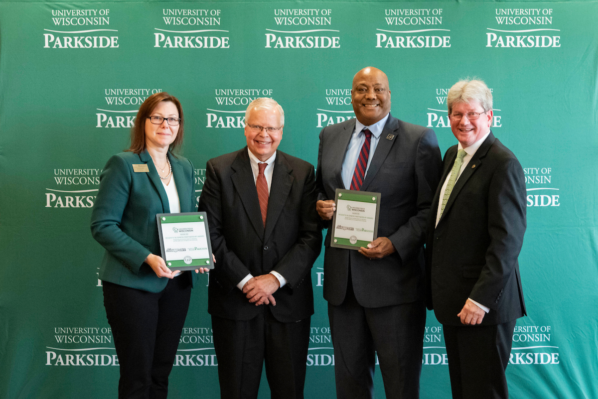 Chancellor Akey, President Rothman, Michael Bond, and Regent Kreuser