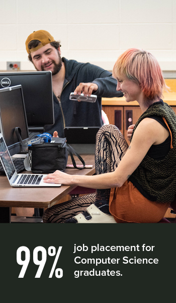 computer science grads have a 99% placement rate Image of two students enjoy work in the computer lab